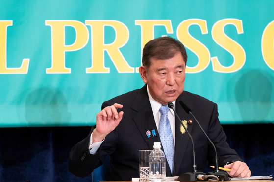Japan's Prime Minister Shigeru Ishiba speaks during a debate with leaders of other political parties at the Japan National Press Club in Tokyo on July 2. [REUTERS/YONHAP]