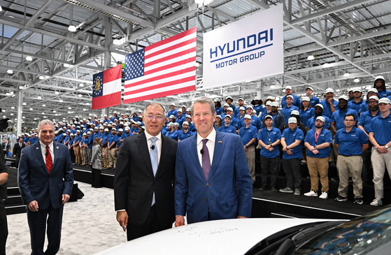 Hyundai Motor Group Executive Chair Euisun Chung, left, and Georgia Gov. Brian Kemp pose for a photo at the Hyundai Motor Group Metaplant America's opening ceremony in Bryan County, Georgia, on March 26. [HYUNDAI MOTOR]