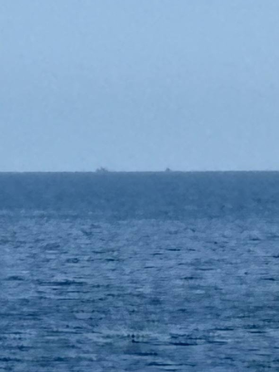 Six North Koreans cross the Northern Limit Line (NLL) in the East Sea by boat on July 9. [MINISTRY OF UNIFICATION]