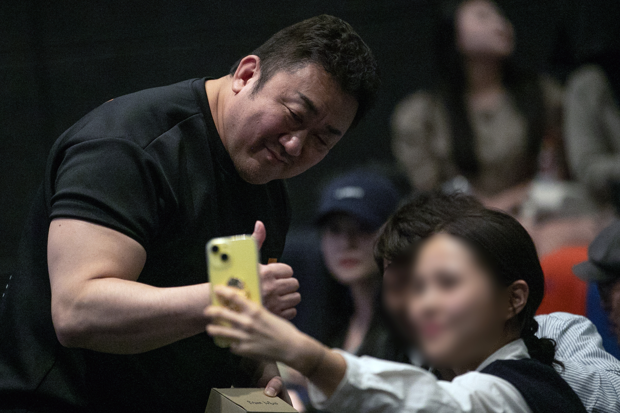 Actor Don Lee takes a photo with the audience during a stage greeting for action film ″The Roundup: Punishment″ (2024) held in Mapo District on May 5, 2024. [NEWS1]