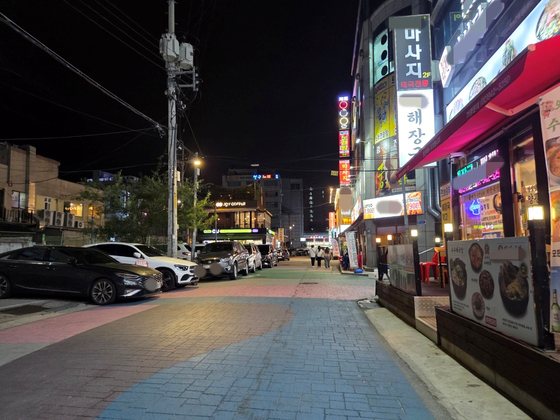 Massage parlors, karaoke bars and meat restaurants are seen near Suraksan Station in Nowon District, northern Seoul on July 4. [SHIN HYE-YEON]