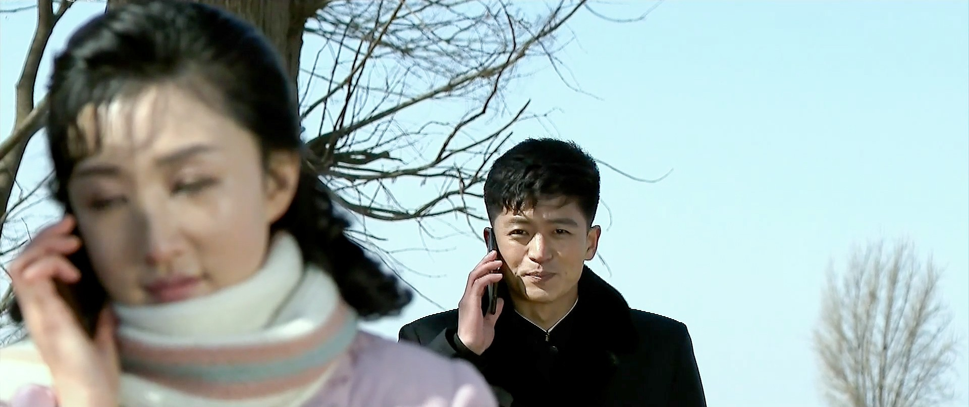 Kyong-mi and Young-deok, lovers in the North Korean drama “A New Spring in the Field of Manchurian Cranes” talk with each other in a scene aired by Korean Central Television. [KOREAN CENTRAL TELEVISION]