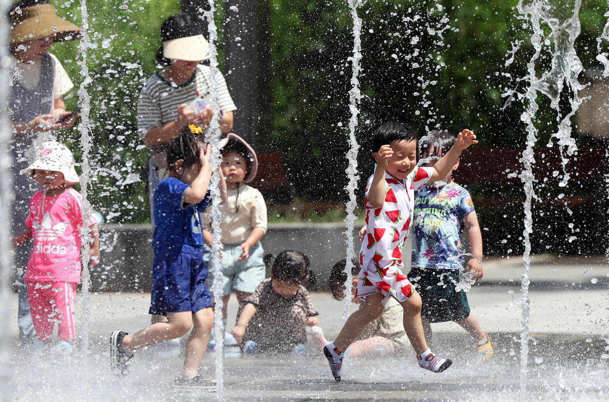 Children play at a park in Gwangju on July 2. [YONHAP]