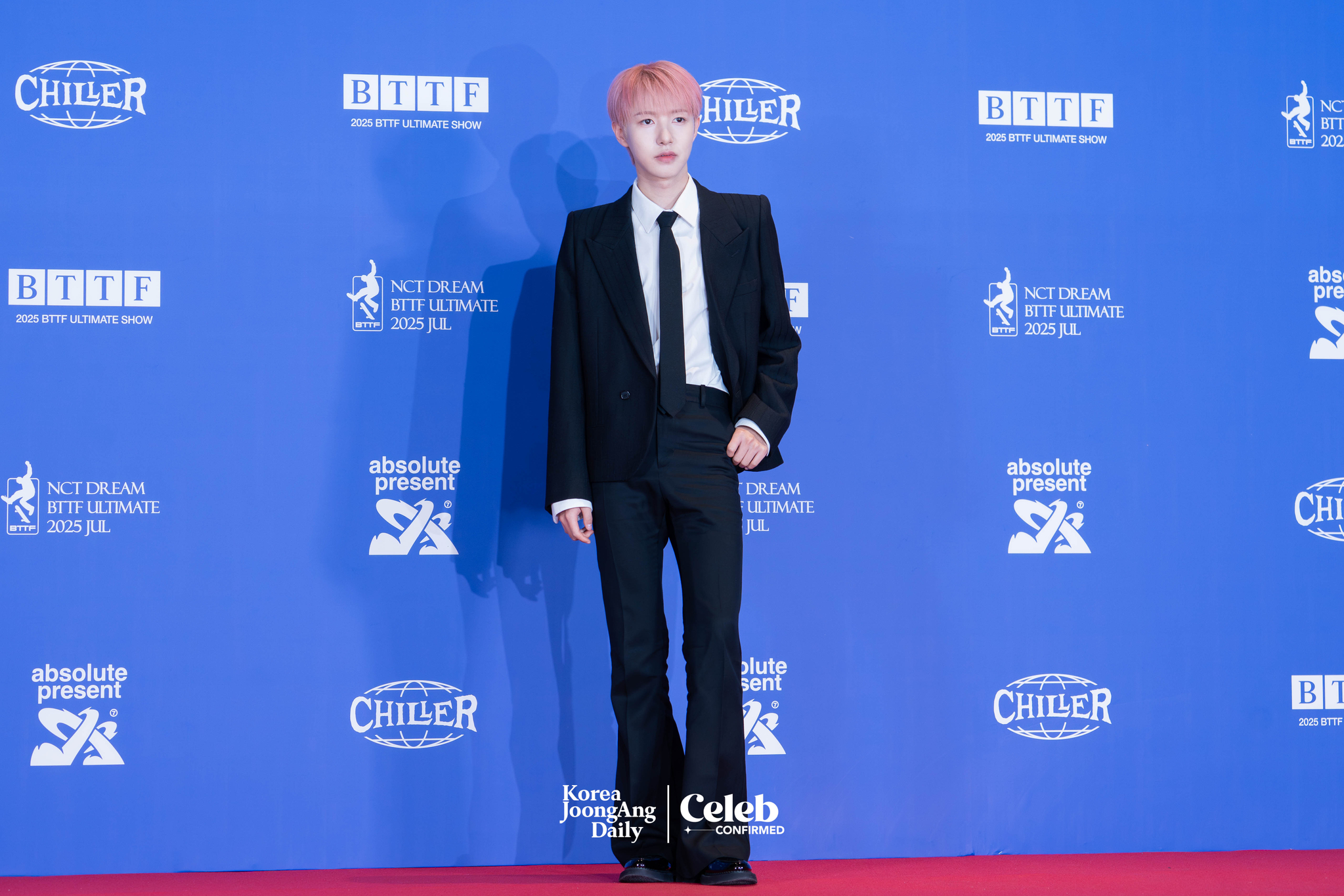 NCT Dream’s Renjun poses for photos during a news conference for the release of the band's fifth full-length album, “Go Back to the Future,” at Lotte Cinema World Tower in southern Seoul on July 14. [DANIELA GONZALEZ PEREZ]