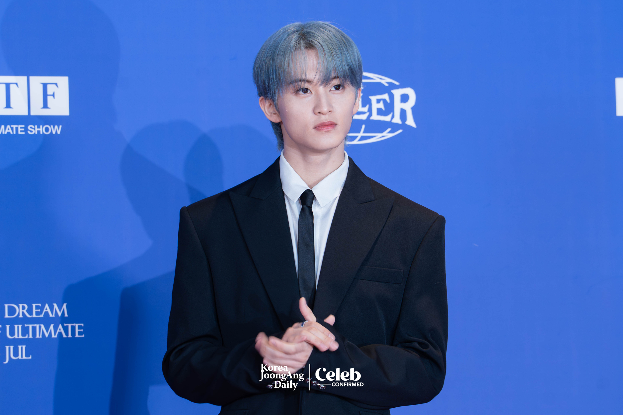 NCT Dream’s Mark poses for photos during a news conference for the release of the band's fifth full-length album, “Go Back to the Future,” at Lotte Cinema World Tower in southern Seoul on July 14. [DANIELA GONZALEZ PEREZ]