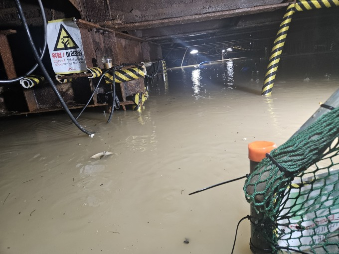 A construction site near Sasang Station in Busan is flooded following overnight downpours on July 14. [BUSAN SAFETY & EXPERIENCE CENTER] 