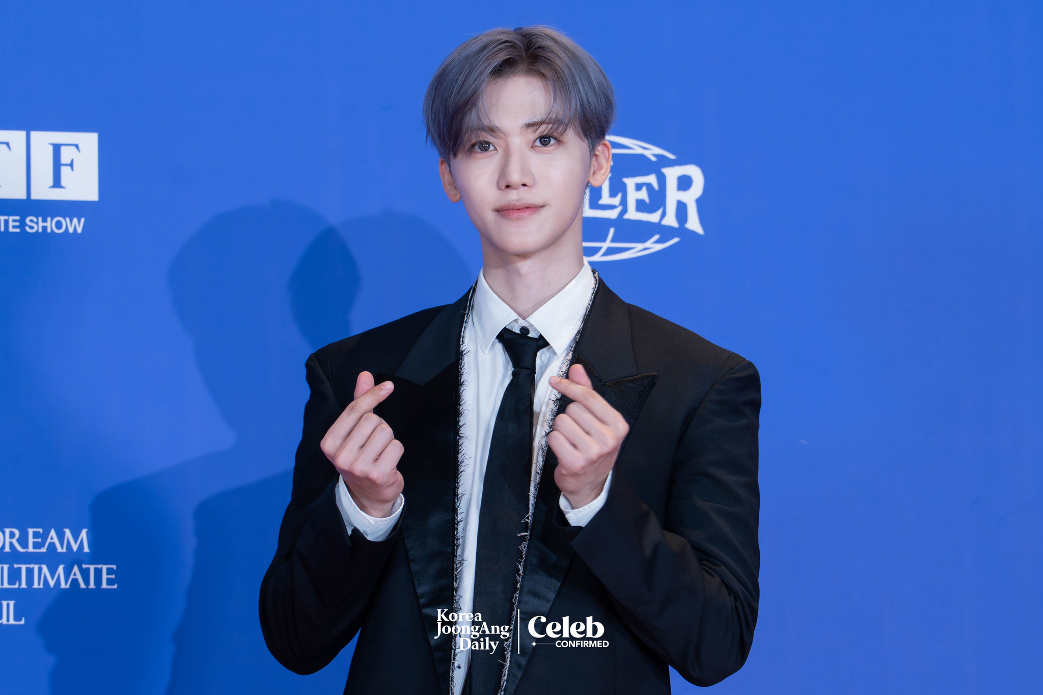 NCT Dream’s Jaemin poses for photos during a news conference for the release of the fifth full-length album, “Go Back to the Future,” at Lotte Cinema World Tower in southern Seoul on July 14. [DANIELA GONZALEZ PEREZ]