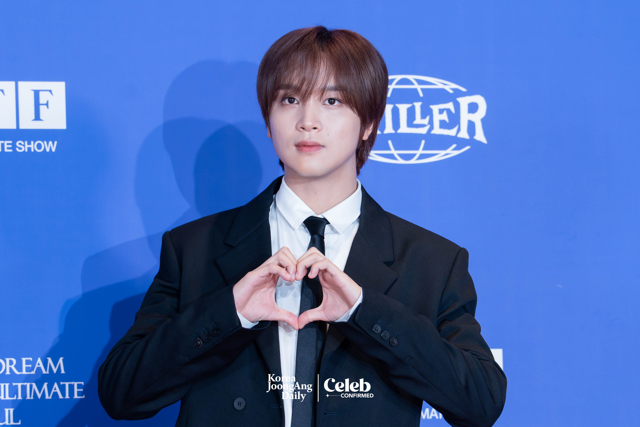 NCT Dream’s Haechan poses for photos during a news conference for the release of the band's fifth full-length album, “Go Back to the Future,” at Lotte Cinema World Tower in southern Seoul on July 14. [DANIELA GONZALEZ PEREZ]