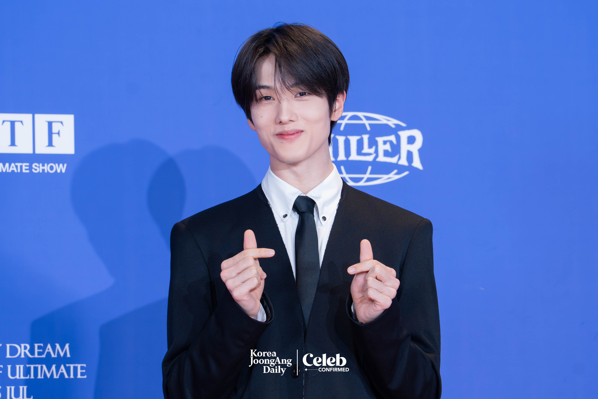 NCT Dream’s Jisung poses for photos during a news conference for the release of the band's fifth full-length album, “Go Back to the Future,” at Lotte Cinema World Tower in southern Seoul on July 14. [DANIELA GONZALEZ PEREZ]