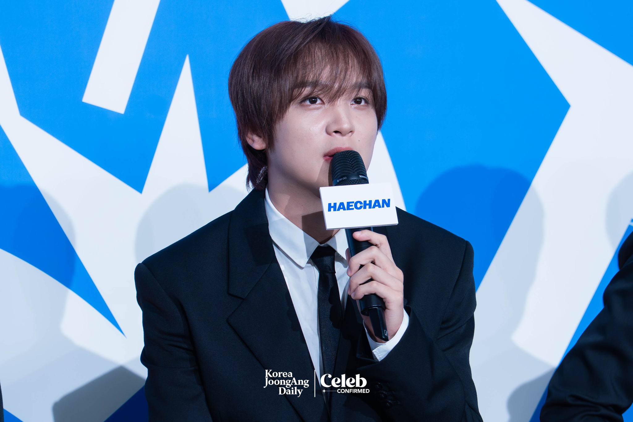 NCT Dream’s Haechan speaks during a news conference for the release of the band's fifth full-length album, “Go Back to the Future,” at Lotte Cinema World Tower in southern Seoul on July 14. [DANIELA GONZALEZ PEREZ]