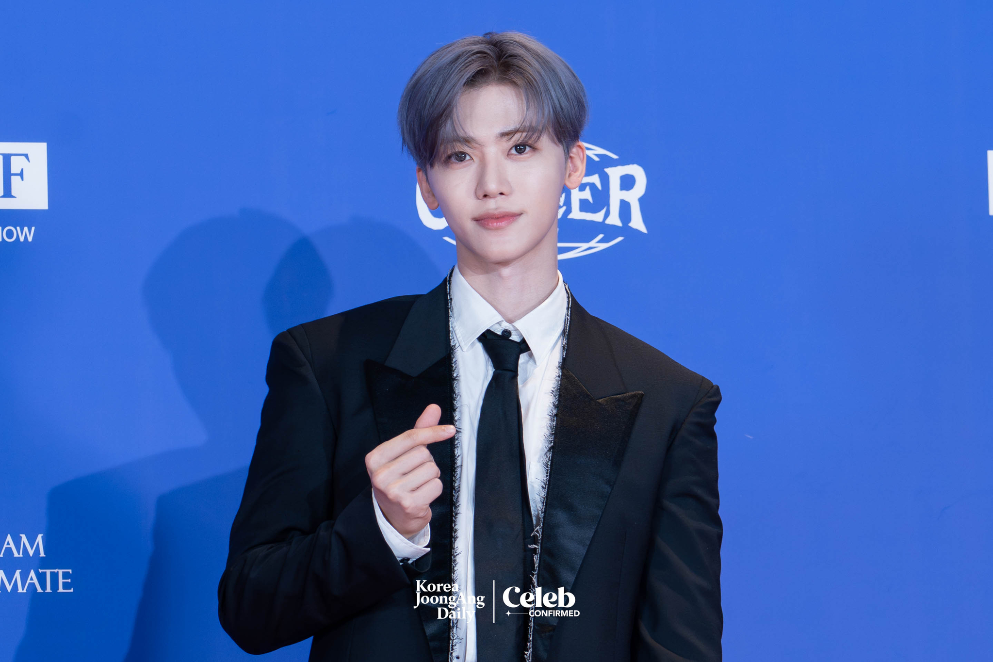 NCT Dream’s Jaemin poses for photos during a news conference for the release of the band's fifth full-length album, “Go Back to the Future,” at Lotte Cinema World Tower in southern Seoul on July 14. [DANIELA GONZALEZ PEREZ]
