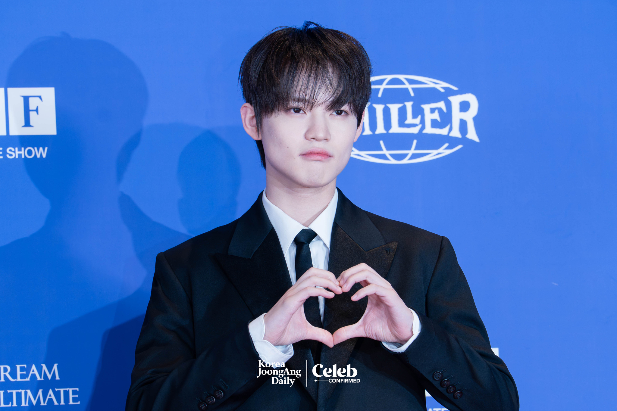 NCT Dream’s Chenle poses for photos during a news conference for the release of the band's fifth full-length album, “Go Back to the Future,” at Lotte Cinema World Tower in southern Seoul on July 14. [DANIELA GONZALEZ PEREZ]
