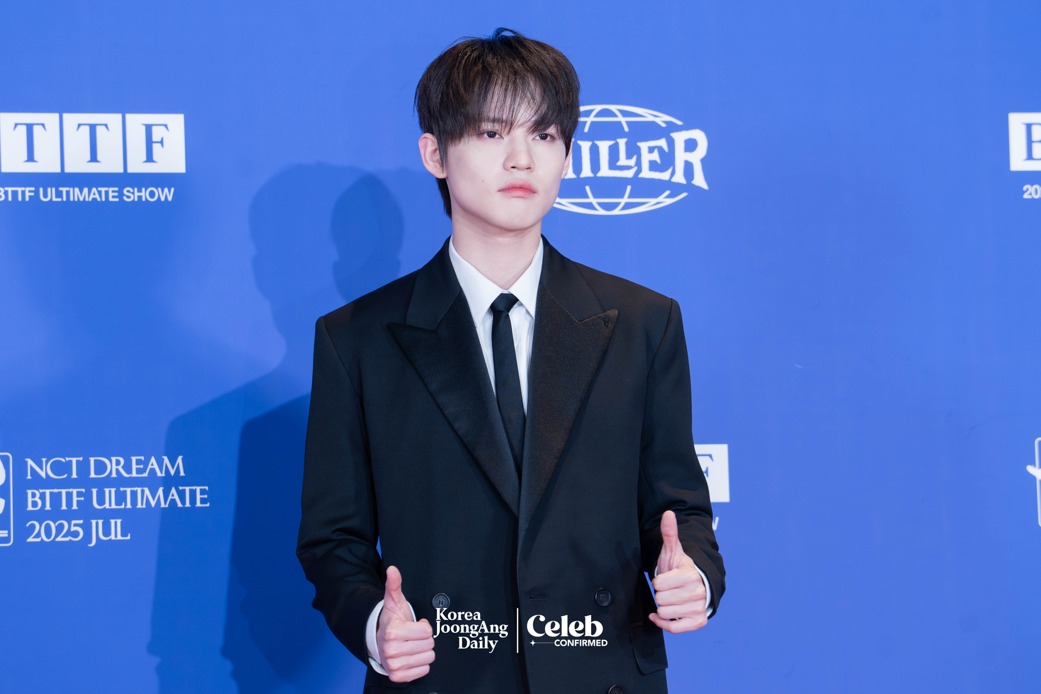 NCT Dream’s Chenle poses for photos during a news conference for the release of the band's fifth full-length album, “Go Back to the Future,” at Lotte Cinema World Tower in southern Seoul on July 14. [DANIELA GONZALEZ PEREZ]