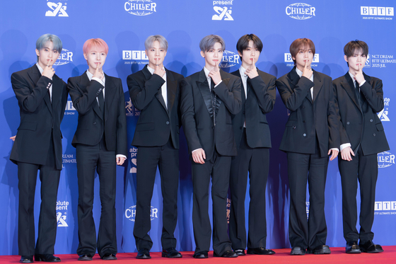 NCT Dream poses for photos during a press conference for its fifth full-length album, ″Go Back To The Future,″ in southern Seoul on July 14. [DANIELA GONZALEZ PEREZ]
