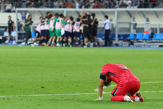 Park Jin-seop reacts in disappointment after Korea's 1-0 loss to Japan in their final Group 3 match at the 2025 EAFF E-1 Football Championship at Yongin Mireu Stadium in Gyeonggi on July 15. [YONHAP]