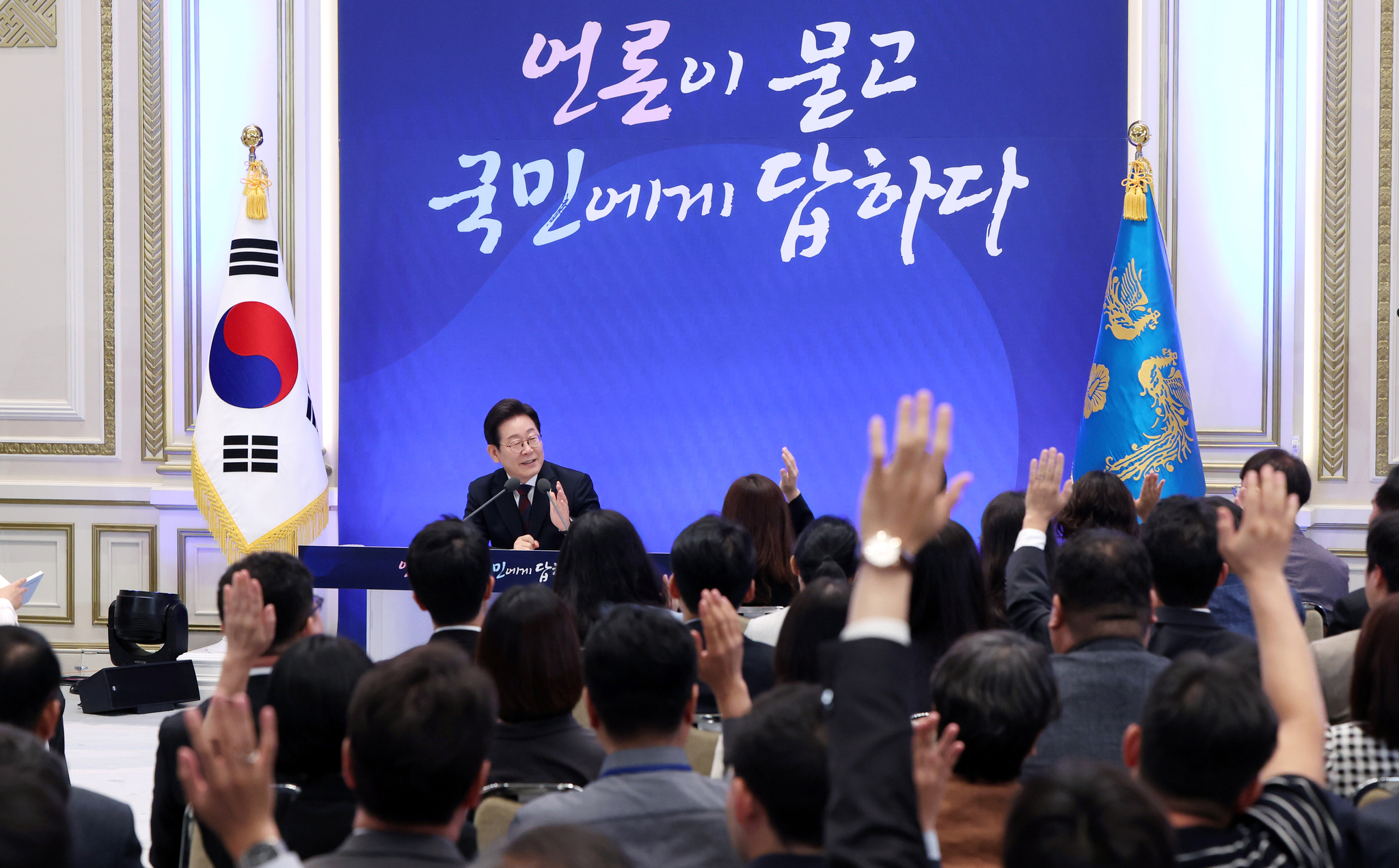 President Lee Jae Myung answers questions from reporters during his first official press conference since taking office, held under the title “30 Days of the President: The Press Asks, the People Get Answers,” at the state guesthouse of the former presidential compound in Jongno District, central Seoul, on July 3. [JOINT PRESS CORPS]