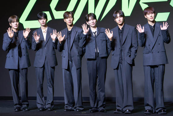 Monsta X poses for photos during a press conference in western Seoul on July 16, ahead of its 10th anniversary concert. [DANIELA GONZALEZ PEREZ]