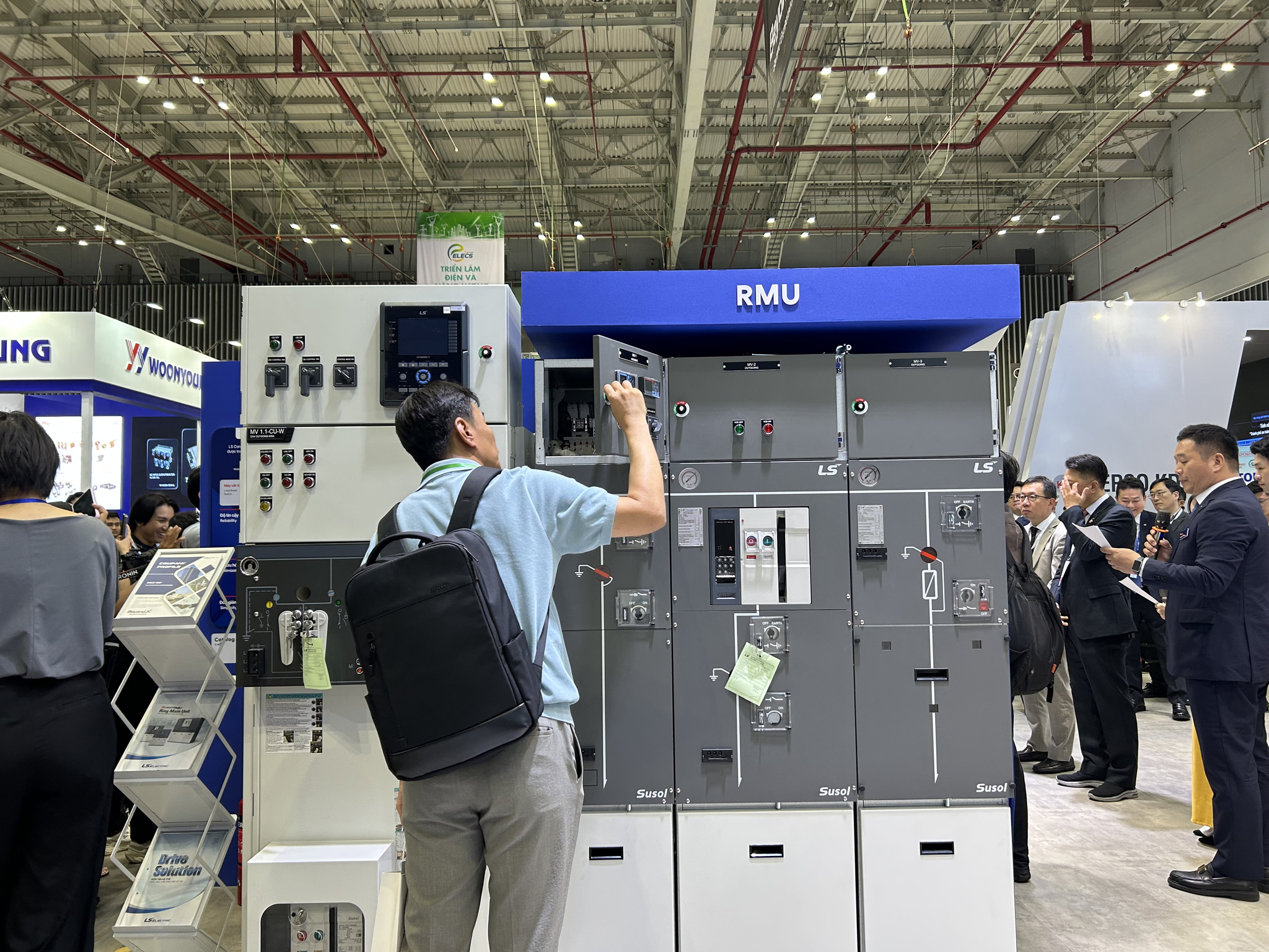 A visitor takes a look at LS Electric's power system product at Elecs Vietnam 2025 at the Saigon Exhibition and Convention Center in Ho Chi Minh City on July 16. [SARAH CHEA]