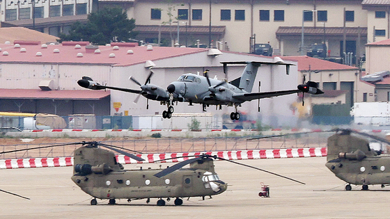 A RC-12X Guardrail reconnaissance aircraft takes off from Camp Humphreys, a U.S. military base in Paengseong-eup, Pyeongtaek, Gyeonggi, on May 23. [NEWS1]