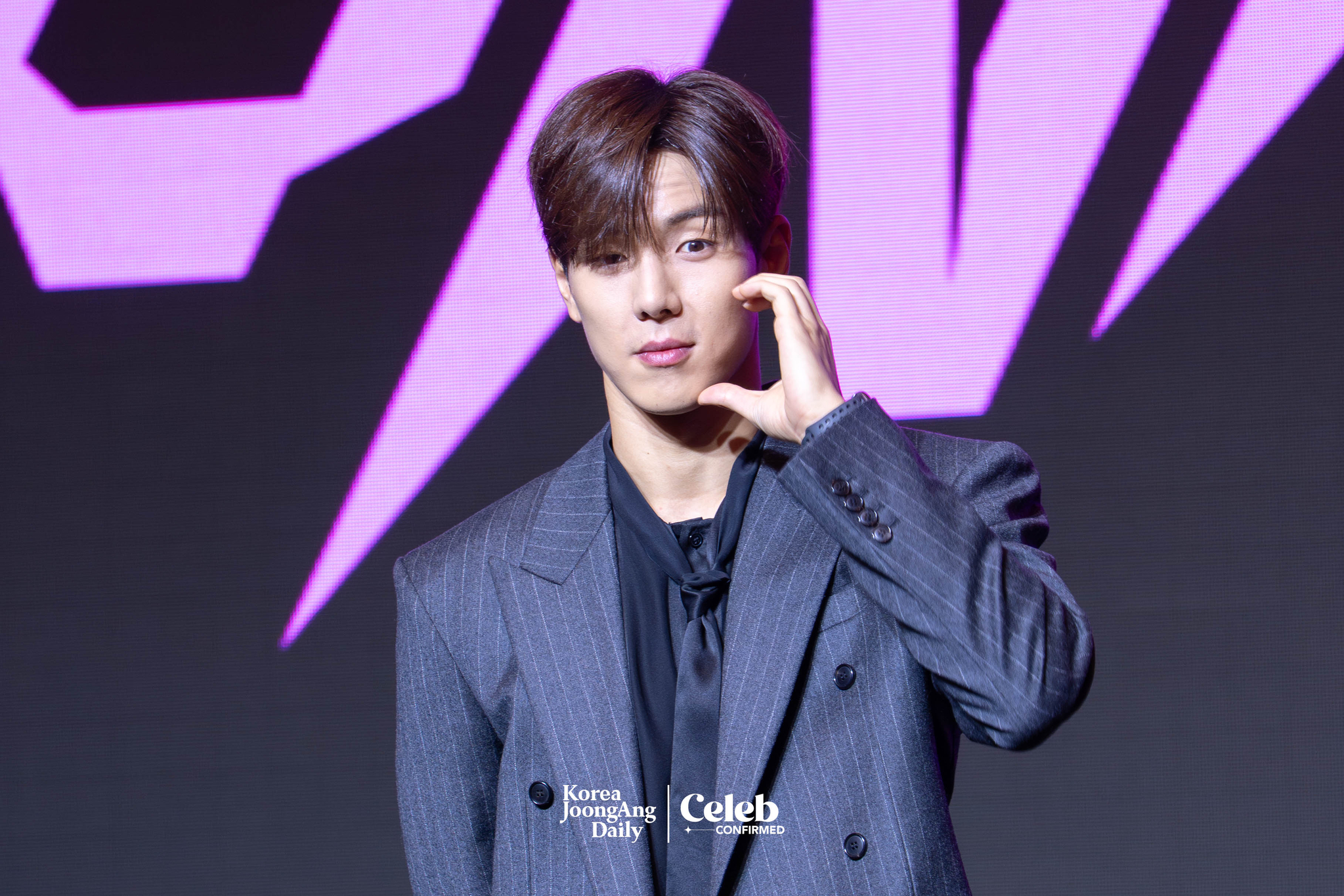 Monsta X’s Shownu poses for photos during a press conference ahead of the band's upcoming 10th anniversary concert, “2025 Monsta X Connect X,” at the Conrad Hotel in western Seoul on July 16. [DANIELA GONZALEZ PEREZ]