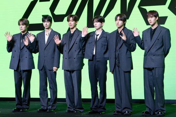 Monsta X poses for photos during a press conference ahead of its 10th anniversary concert in western Seoul on July 16. [DANIELA GONZALEZ PEREZ]