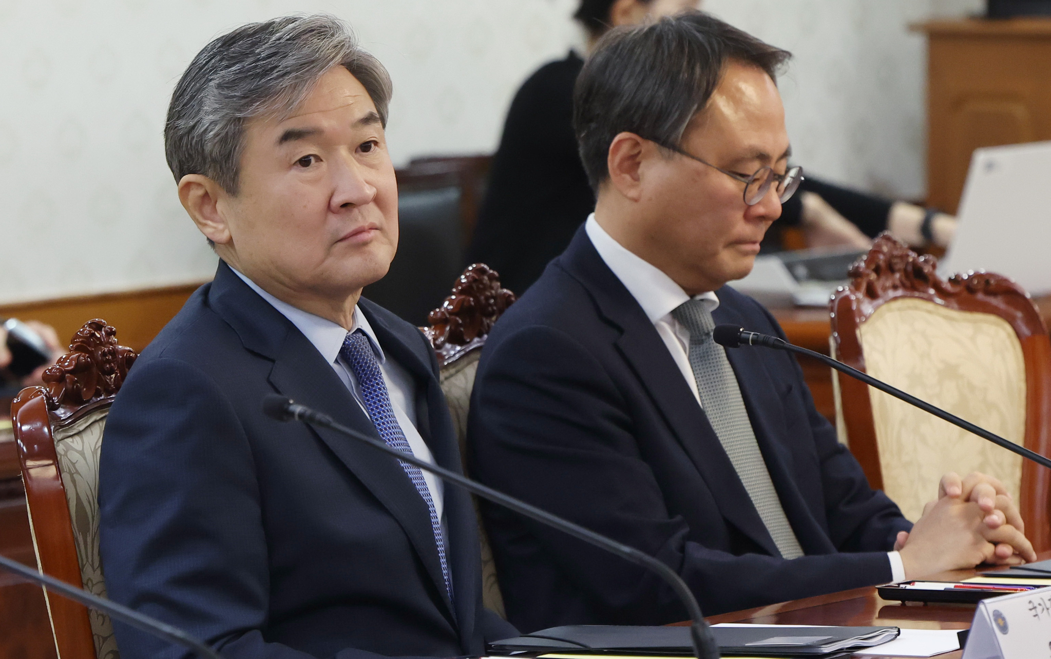 Former National Intelligence Service Director Cho Tae-yong, left, attends a National Security Council meeting at the government complex in central Seoul on March 24. [JOINT PRESS CORPS]