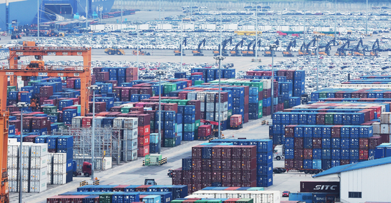 Containers are piled up at a port in Pyeongtaek, Gyeonggi, on July 4. [YONHAP]