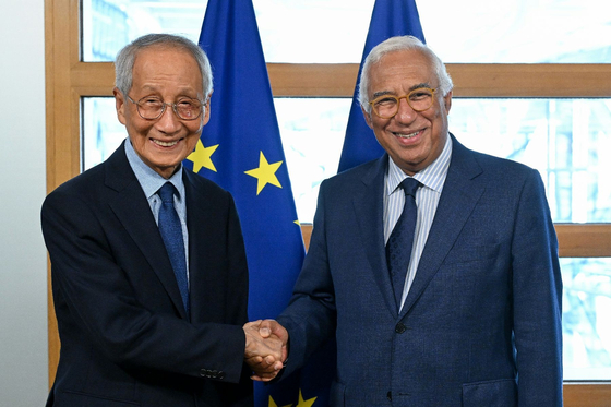 Special presidential envoy Yoon Yeo-joon, left, poses with Antonio Costa, president of the European Council, during their meeting in Brussels on July 15, in this photo provided by Korea's Foreign Ministry. [YONHAP] 