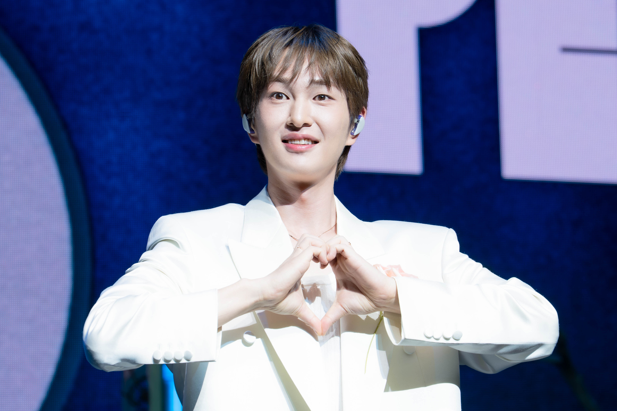 Onew poses for photos during a press showcase for his second solo full-length album ″Percent″ in western Seoul on July 15. [DANIELA GONZALEZ PEREZ]