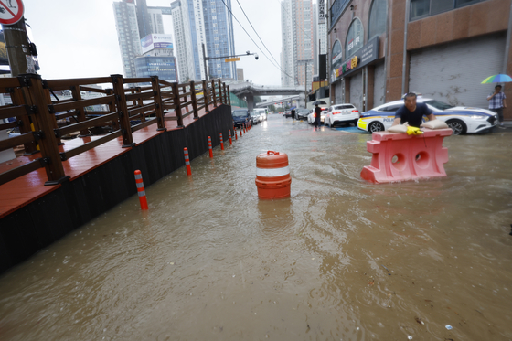 Commercial buildings are flooded in Nam District, Gwangju, on July 17. [NEWS1]