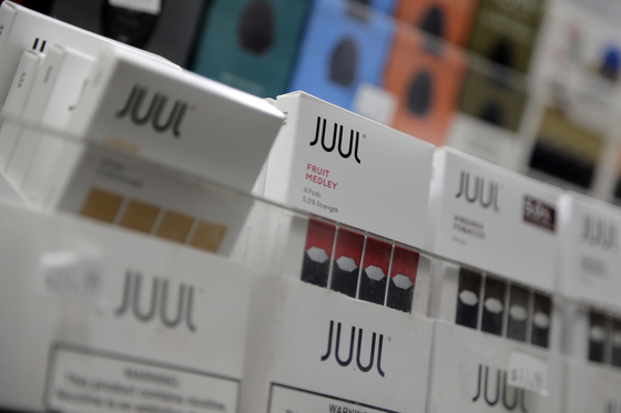 Juul products are displayed at a smoke shop in New York, on Dec. 20, 2018. [AP/YONHAP]