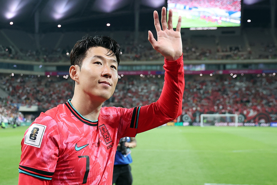 Korea's Son Heung-min waves to fans after a 2026 World Cup qualifier against Kuwait at Seoul World Cup Stadium in western Seoul on June 10. [NEWS1] 
