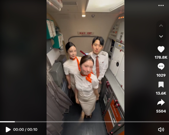 Jeju Air employees are seen dancing in a TikTok video uploaded to the airline's official account [SCREEN CAPTURE]