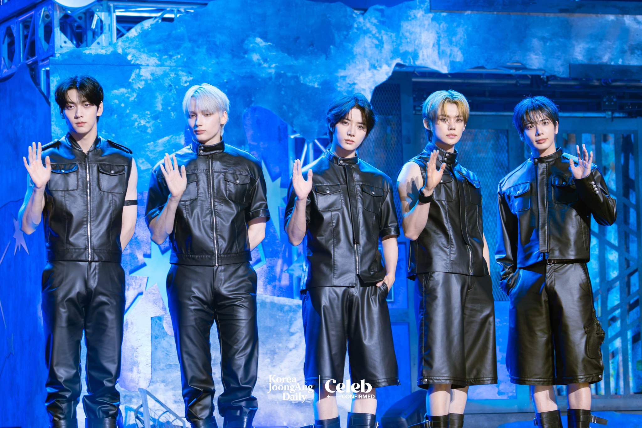 Boy band Tomorrow X Together poses for photos during a showcase for the release of its fourth full-length album, “The Star Chapter: Together,” at Kyung Hee University Grand Peace Palace in eastern Seoul on July 21. [DANIELA GONZALEZ PEREZ]