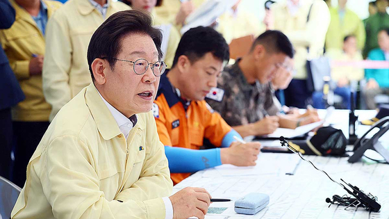 President Lee Jae Myung speaks during an emergency meeting on rainfall damage at a community center in Sancheong, South Gyeongsang, on July 21. [JOINT PRESS CORPS]