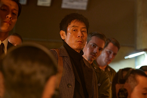 A still, provided by Netflix, shows actor Sul Kyung-gu, center, from ″Good News.″ [NETFLIX]