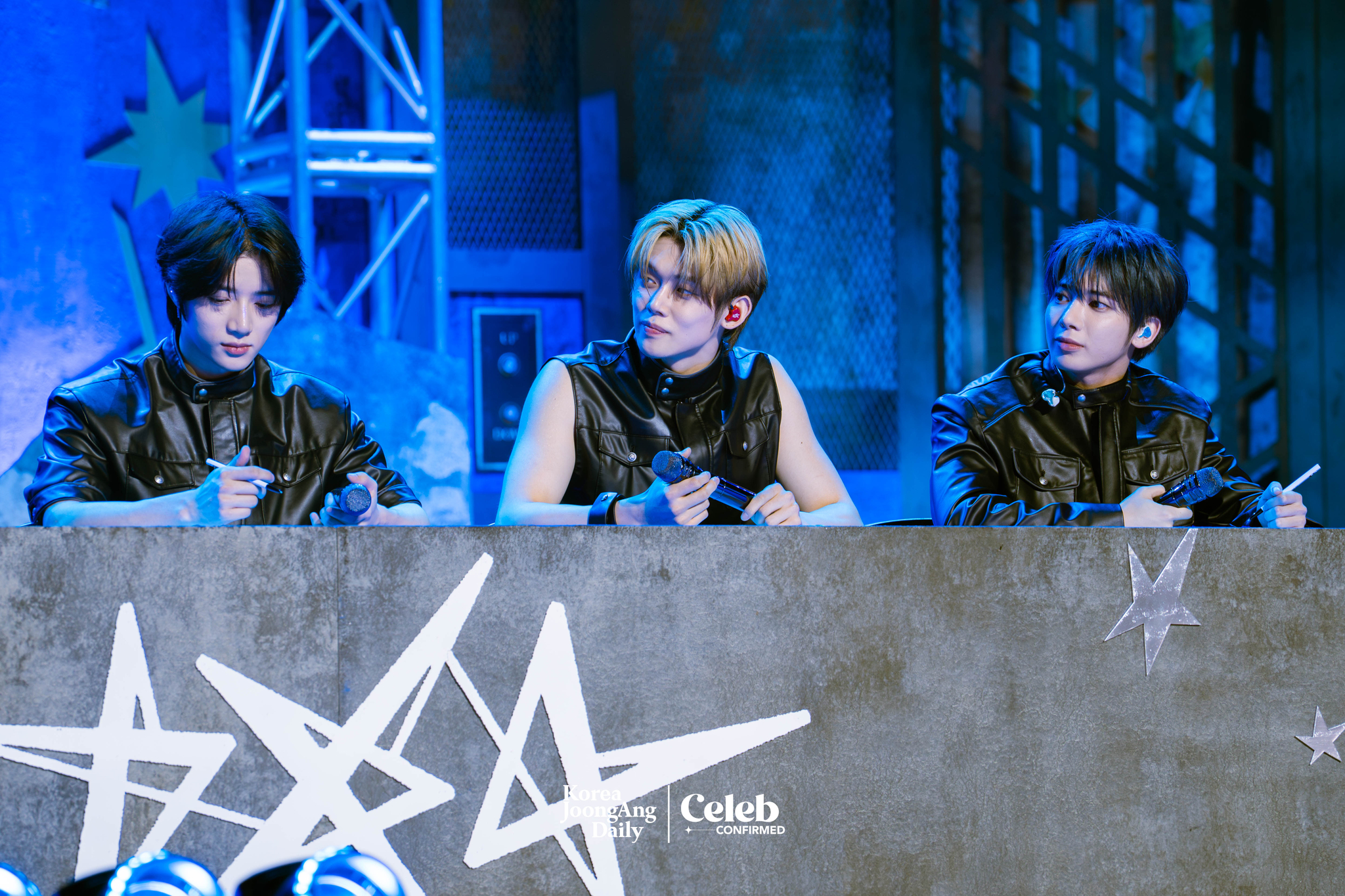 Boy band Tomorrow X Together answers questions during a showcase for the release of its fourth full-length album, “The Star Chapter: Together,” at Kyung Hee University Grand Peace Palace in eastern Seoul on July 21. [DANIELA GONZALEZ PEREZ]