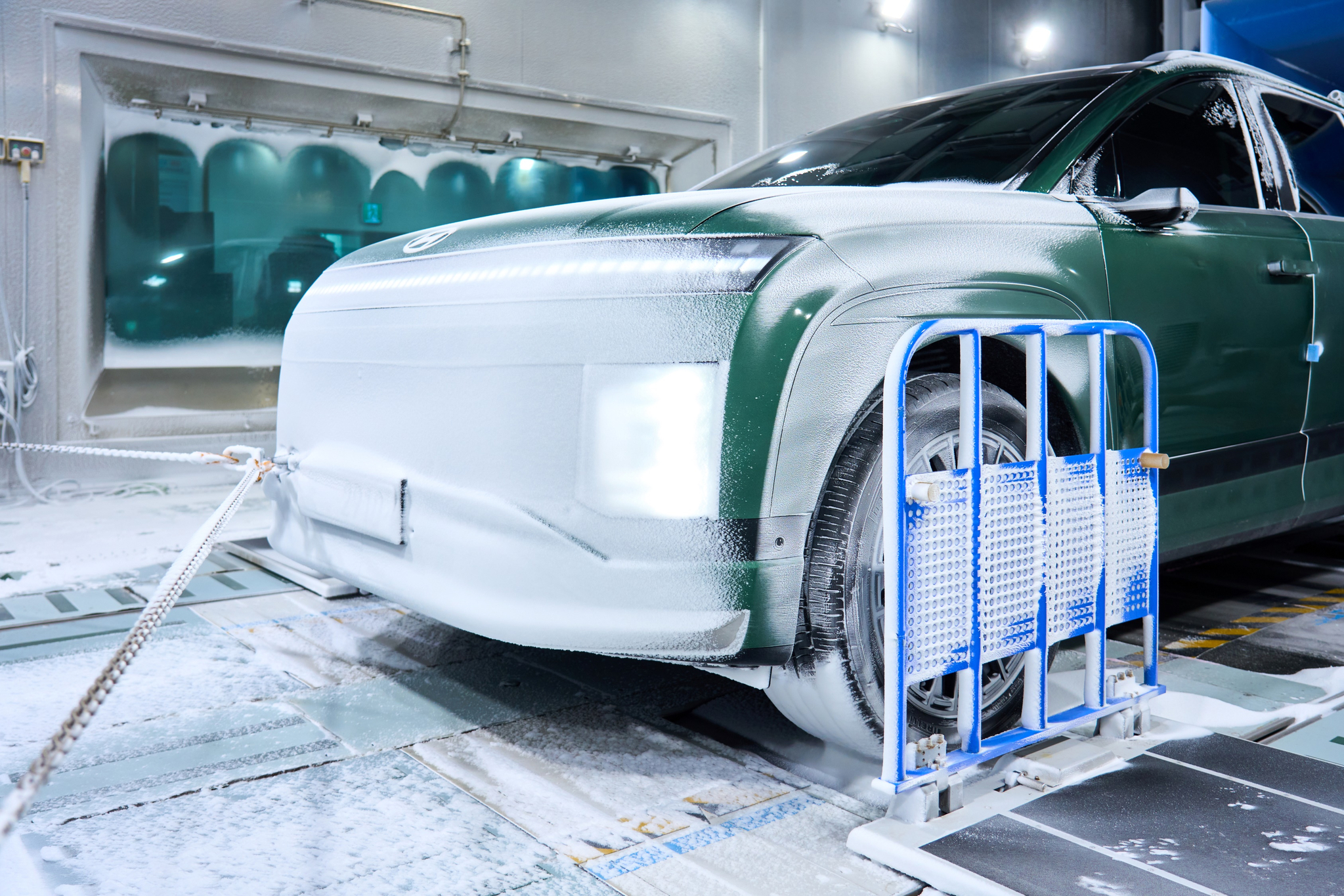 An Ioniq 9 EV sits blanketed in snow inside the environmental testing facility, where vehicles are tested under simulated snowfall at Hyundai Motor Group's Namyang R&D Center in Hwaseong, Gyeonggi, on July 23. [HYUNDAI MOTOR] 