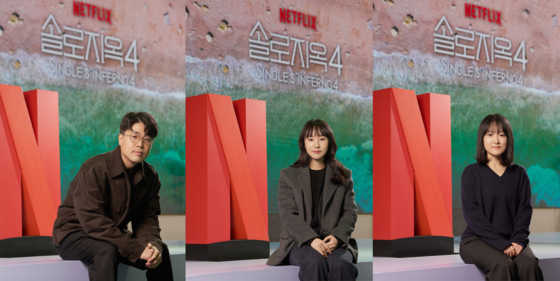Producers Kim Jae-won, from left, Kim Jung-hyun and Park Su-ji of the fourth season of Netflix hit dating show ″Single's Inferno″ (2021-) [NETFLIX]