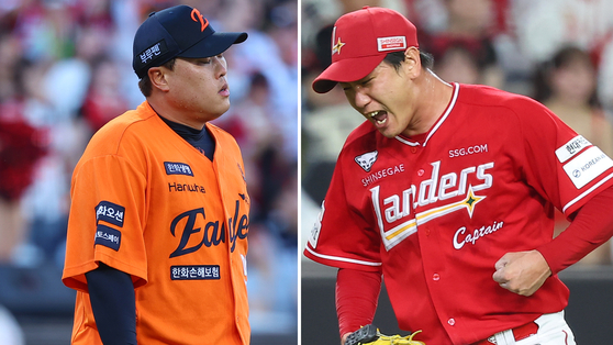 This picture shows Ryu Hyun-jin of the Hanwha Eagles, left, and Kim Kwang-hyun of the SSG Landers react during the two clubs' head-to-head KBO game at Daejeon Hanwha Life Ballpark in Daejeon on July 26. [YONHAP]