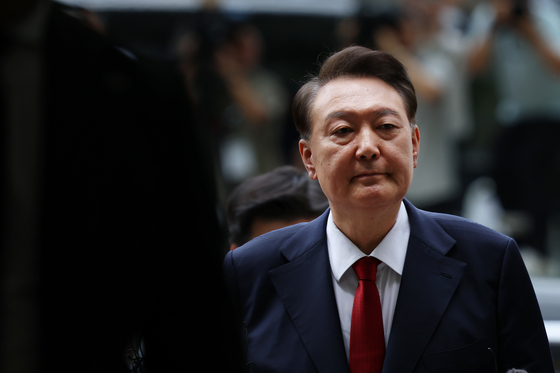 Former President Yoon Suk Yeol, who is under investigation by a special counsel over the Dec. 3 martial law case, appears at the Seoul Central District Court in southern Seoul on July 9 for his second pretrial detention hearing. [NEWS1] 