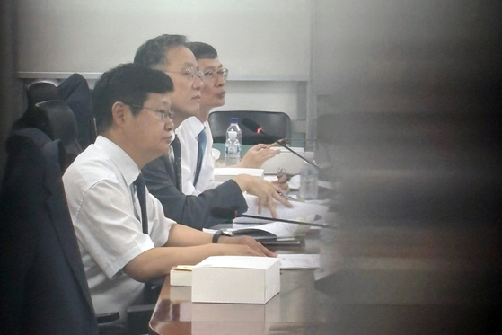 First Vice Finance Minister Lee Hyoung-il, second from left, attends a party-government consultation meeting on tax reform held at the National Assembly members' office building in Yeouido, western Seoul, on July 29. [YONHAP]