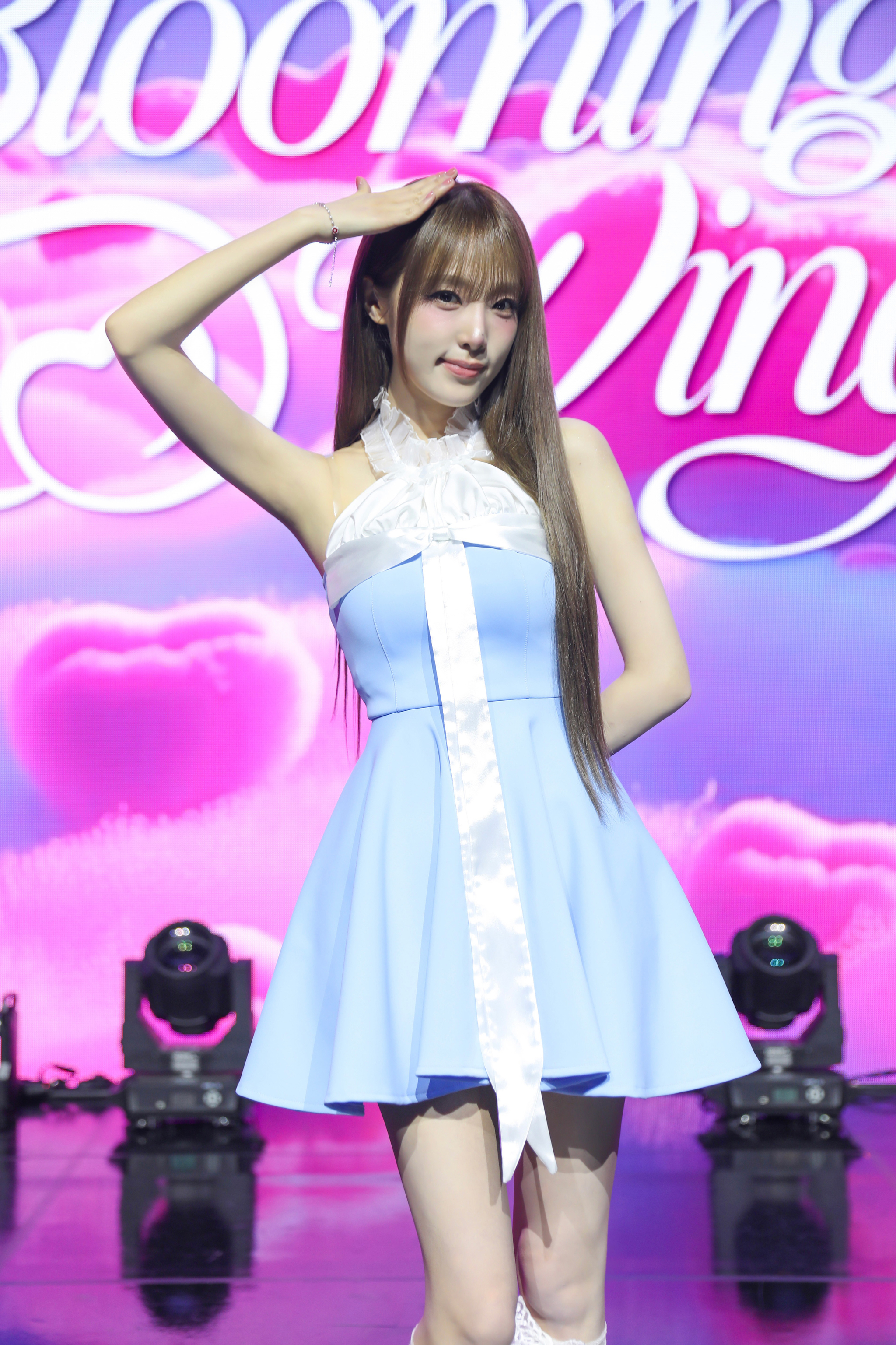 Singer Yena poses for photos during a press showcase for her fourth EP ″Blooming Wings″ at Blue Square SOL Travel Hall in central Seoul on July 29. [YUE HUA ENTERTAINMENT]