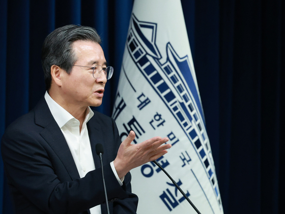 Kim Yong-beom, director of national policy, answers questions from reporters at the presidential office in central Seoul on July 31. [YONHAP] 