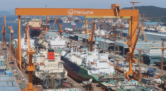 A ship under construction is seen at Hanwha Ocean’s Geoje shipyard in Aju-dong, Geoje, South Gyeongsang, on July 31. [YONHAP]