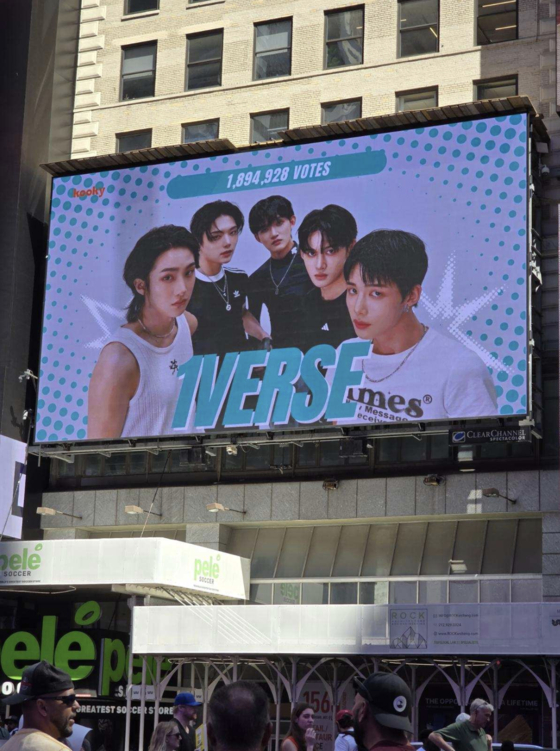 A promotional campaign for 1Verse is displayed in Times Square, New York, in July. [SINGING BEETLE]