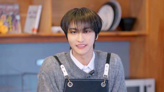 Seonghwa of boy band Ateez poses for photos during an interview with the JoongAng Ilbo. [JOONGANG ILBO]