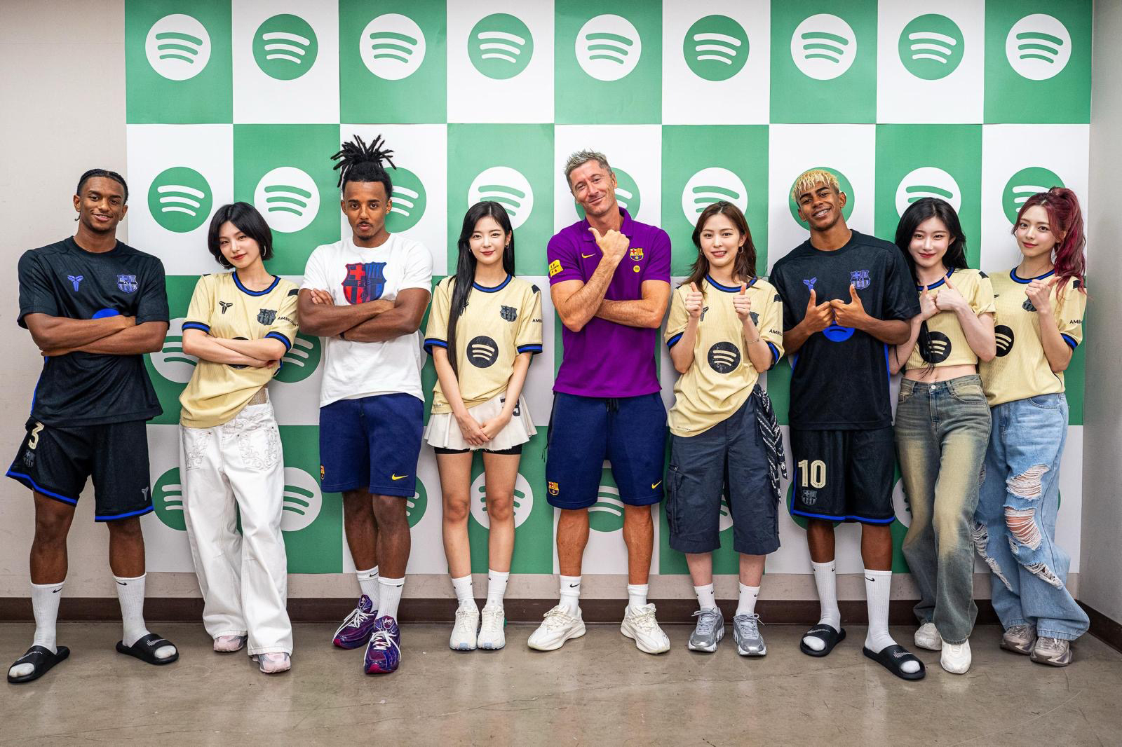 FC Barcelona players and ITZY members pose in a photo shared by Edelman Korea on Aug. 4. [EDELMAN KOREA]