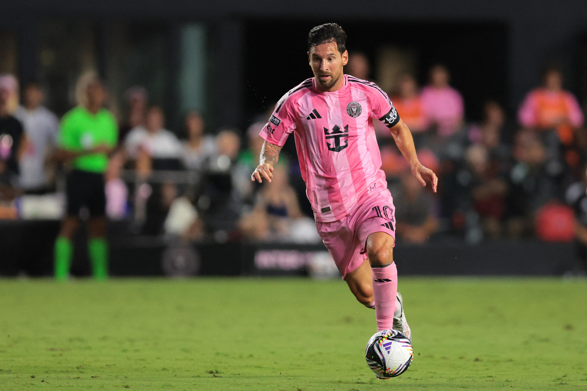 Inter Miami CF forward Lionel Messi dribbles the ball against Atlas FC during the first half of a group stage Leagues Cup match at Chase Stadium in Fort Lauderdale, Florida, on July 30.  [YONHAP]