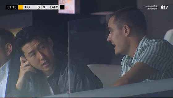 Korean football star Son Heung-min is seen watching a match between Los Angeles FC and Tigres of Mexico at BMO Stadium in Los Angeles on Aug. 5. [SCREEN CAPTURE]